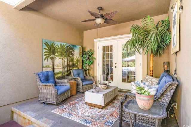 view of patio with french doors and ceiling fan