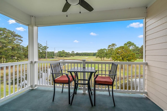 balcony featuring ceiling fan