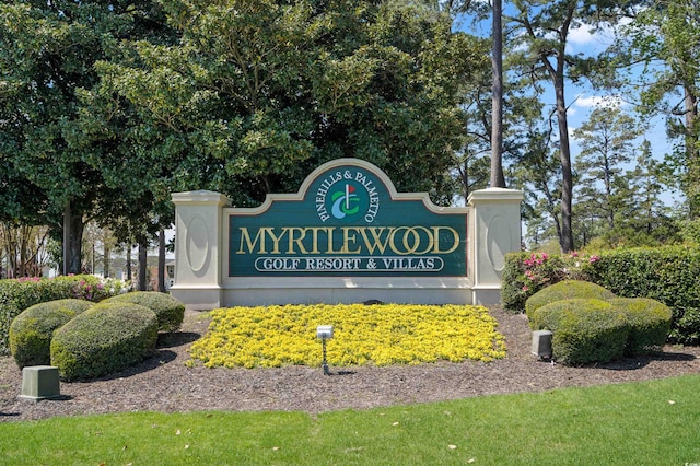 view of community sign