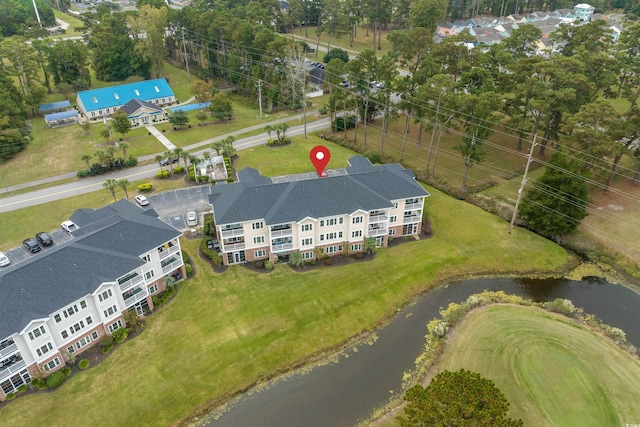 bird's eye view with a water view