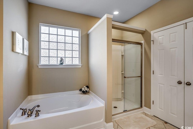 full bathroom with recessed lighting, tile patterned floors, a garden tub, and a stall shower