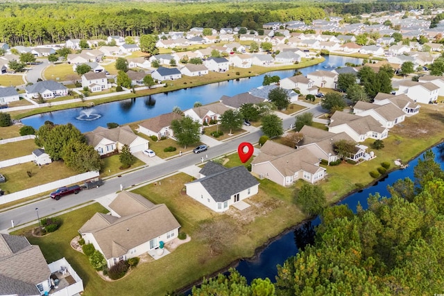 aerial view featuring a residential view and a water view