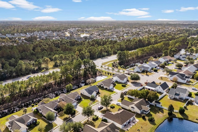 aerial view featuring a water view and a residential view