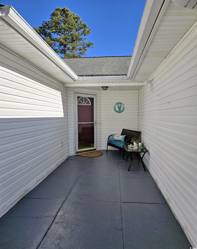 2169 Wedgewood Dr, Longs, SC 29568 - entrance to property with roof with shingles and a patio