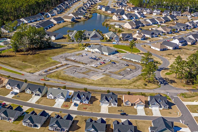 aerial view with a water view and a residential view