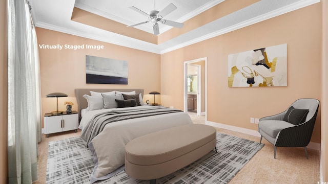 bedroom featuring light colored carpet, ceiling fan, ensuite bath, and ornamental molding