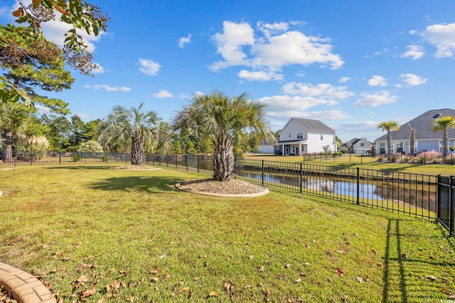 view of yard with a water view