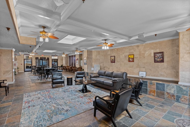 living room with beamed ceiling, coffered ceiling, ornamental molding, and a skylight