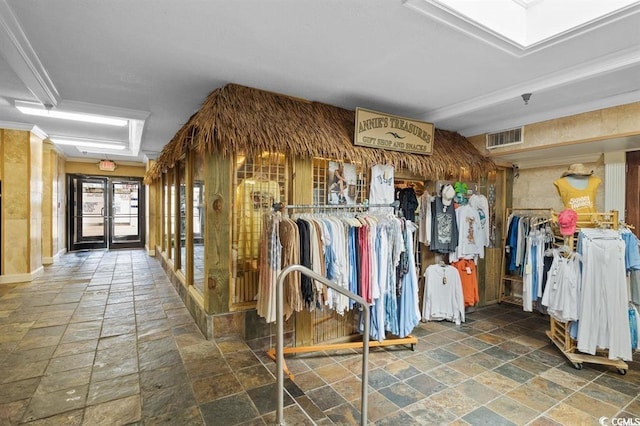 spacious closet featuring french doors