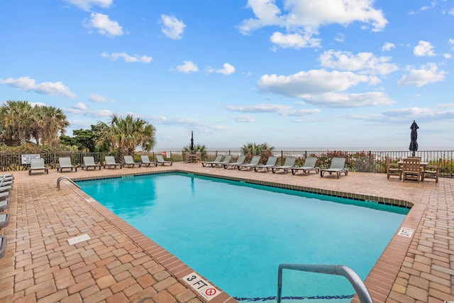 view of pool featuring a patio