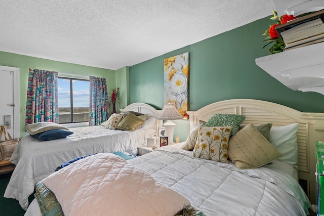 bedroom featuring a textured ceiling