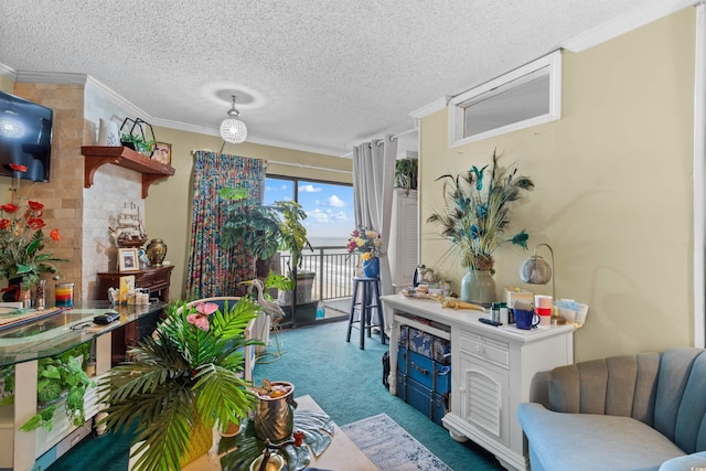 sitting room with ornamental molding, light colored carpet, and a textured ceiling