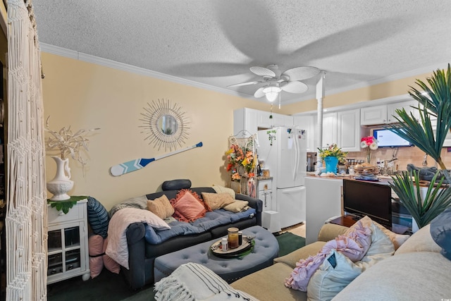 living room with ornamental molding, a textured ceiling, and ceiling fan