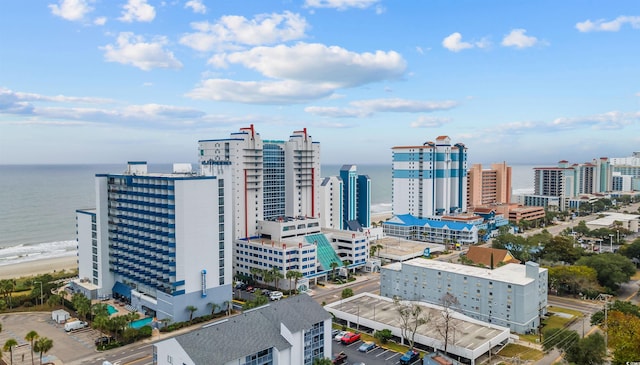 property's view of city featuring a water view