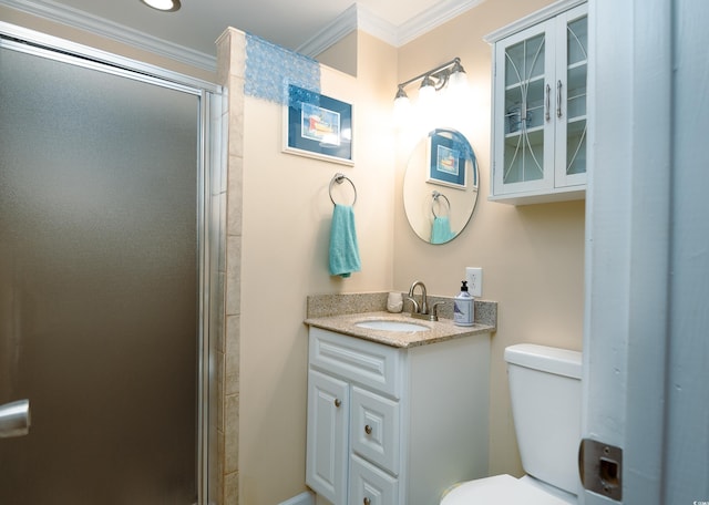 bathroom featuring toilet, ornamental molding, walk in shower, and vanity