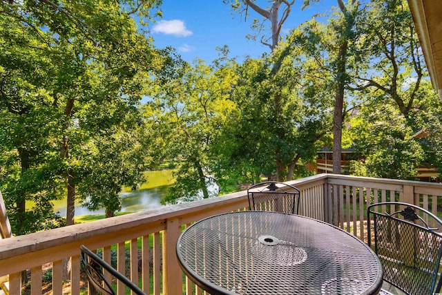 deck featuring a water view