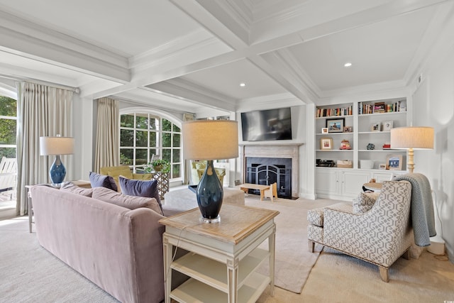 living area with beam ceiling, crown molding, plenty of natural light, and a fireplace