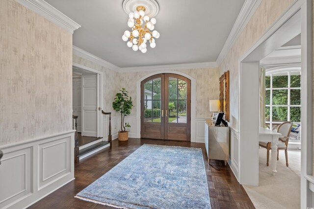 living room with built in shelves and crown molding