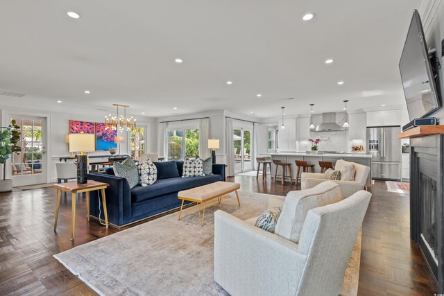 bar featuring wine cooler, white cabinetry, ornamental molding, and plenty of natural light