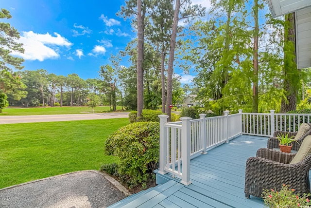 wooden deck with a yard