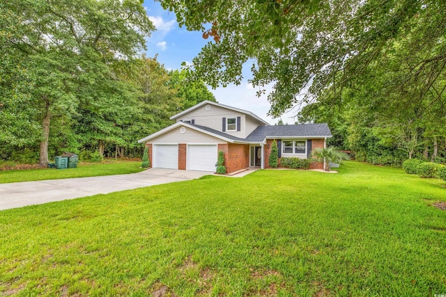 view of front of house with a front lawn and a garage