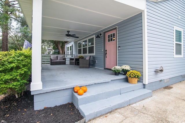 view of patio with ceiling fan and a porch