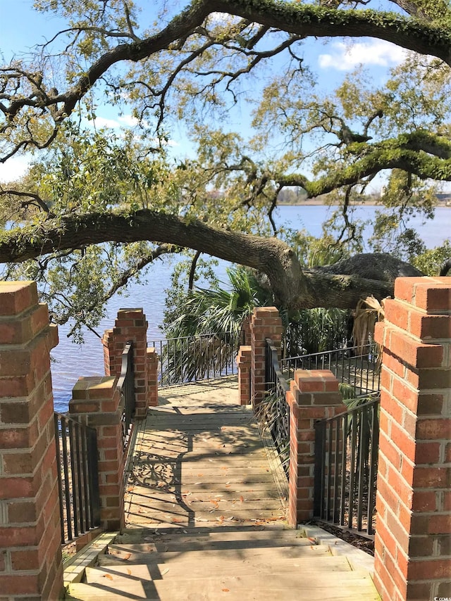 view of community featuring a water view