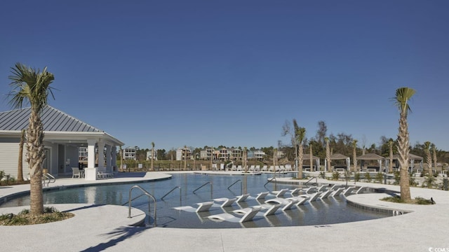 view of pool featuring a patio