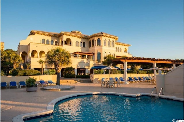 view of pool with a patio