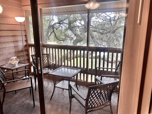 sunroom / solarium featuring plenty of natural light