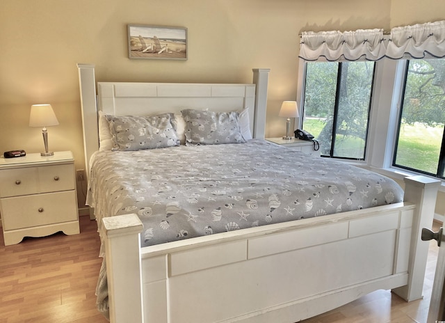 bedroom with light hardwood / wood-style flooring