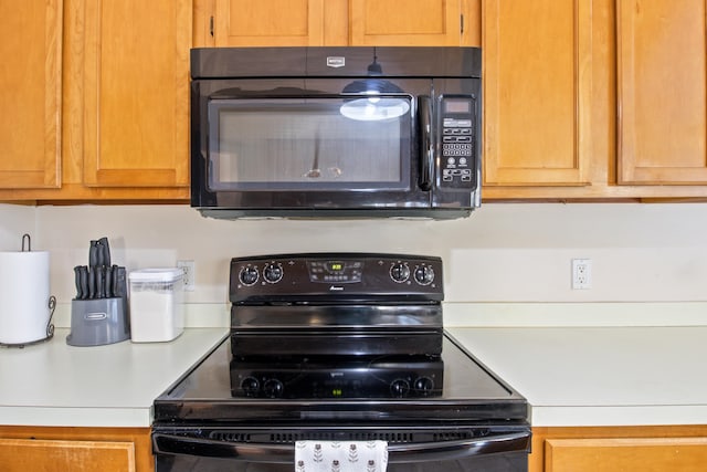 kitchen featuring black appliances