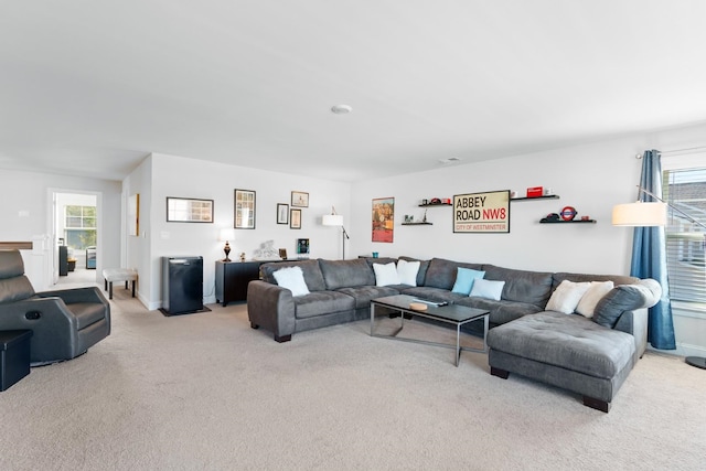 living room featuring light colored carpet