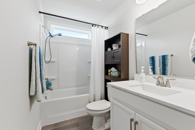 full bathroom with vanity, toilet, wood-type flooring, and shower / bath combo