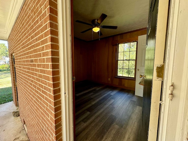 interior space featuring ceiling fan