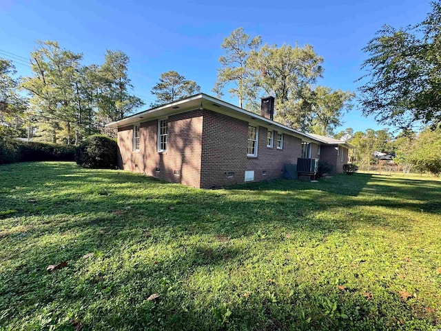 view of home's exterior featuring a lawn