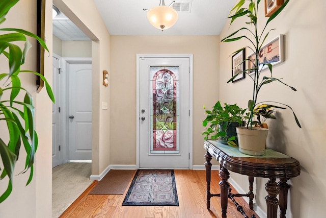 foyer featuring hardwood / wood-style floors