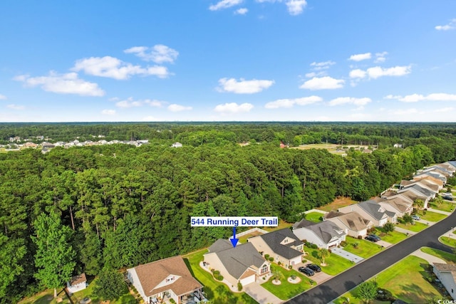 544 Running Deer Trl, Myrtle Beach, SC 29588 - aerial view of residential area with a heavily wooded area