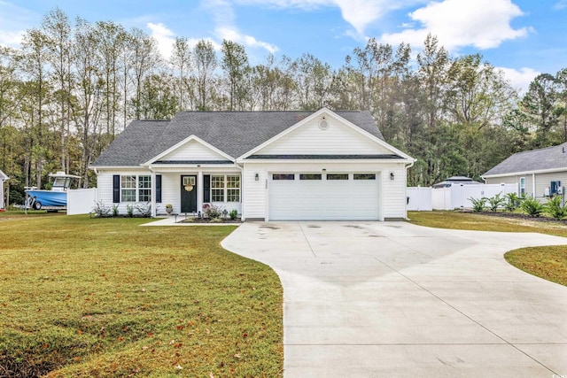 view of front facade featuring a garage and a front lawn