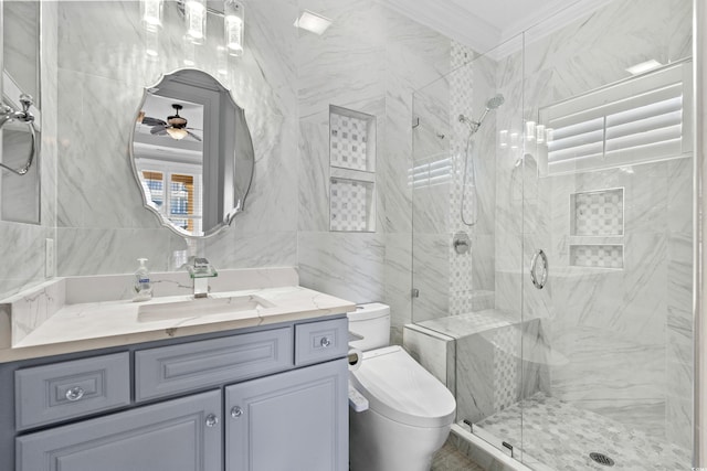 bathroom with an enclosed shower, vanity, ceiling fan, crown molding, and toilet