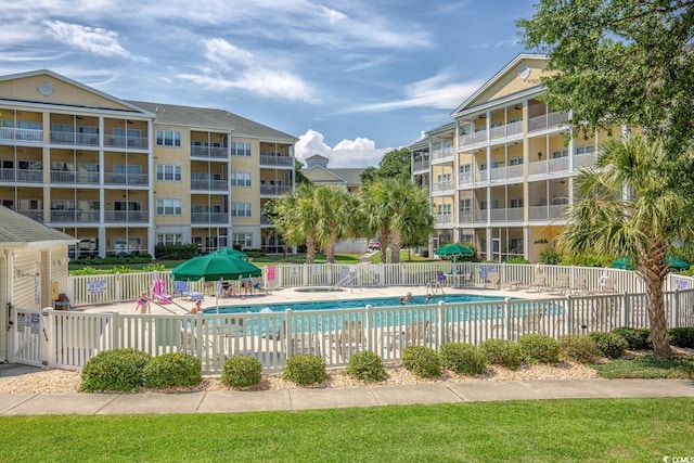 view of swimming pool with a patio