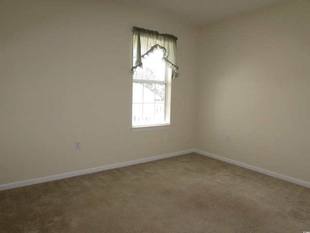 view of carpeted spare room