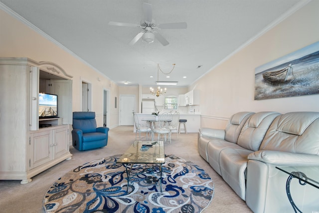 carpeted living room with ceiling fan with notable chandelier and ornamental molding