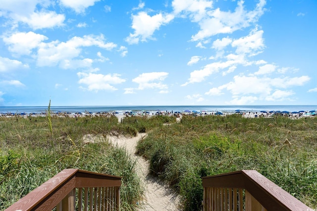 property view of water featuring a beach view