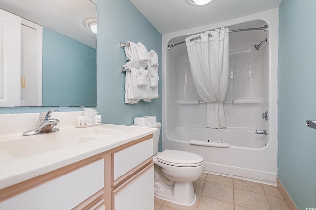 full bathroom featuring vanity, shower / bath combo with shower curtain, tile patterned floors, and toilet