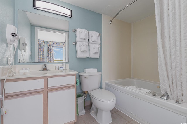 full bathroom featuring toilet, shower / bath combo, vanity, and tile patterned floors