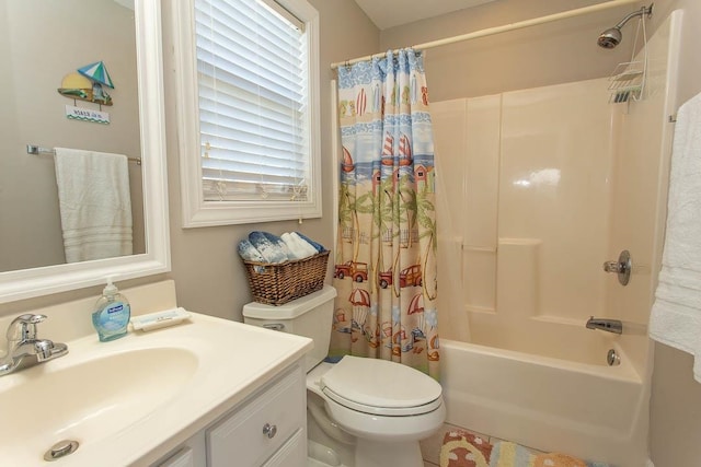 full bathroom featuring shower / bath combo with shower curtain, vanity, and toilet