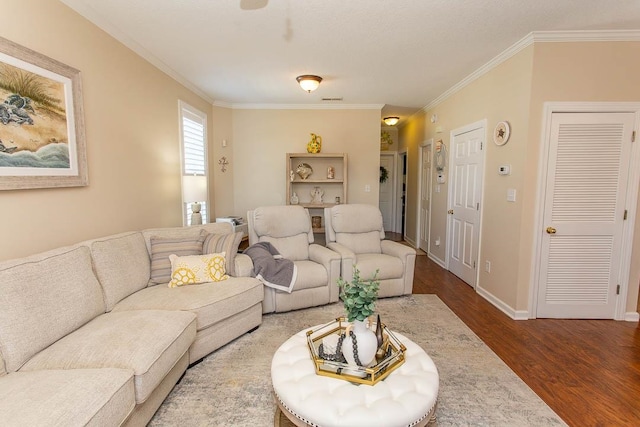 living room featuring dark wood-type flooring and crown molding