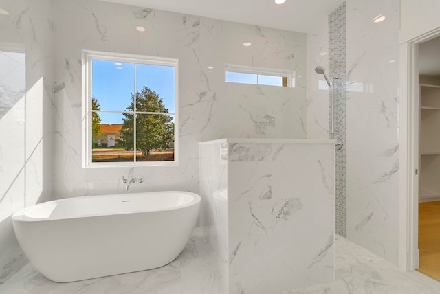 2313 Summersweet Ln, Myrtle Beach, SC 29579 - full bath featuring a freestanding bath, marble tiled flooring, and a marble finish shower