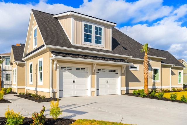 2313 Summersweet Ln, Myrtle Beach, SC 29579 - view of front of home with driveway, an attached garage, stucco siding, and roof with shingles